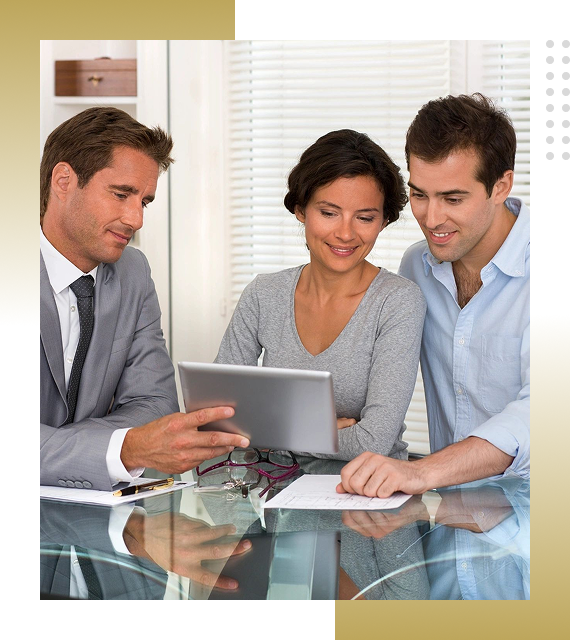 Three professionals collaborating on a project using a tablet in an office.