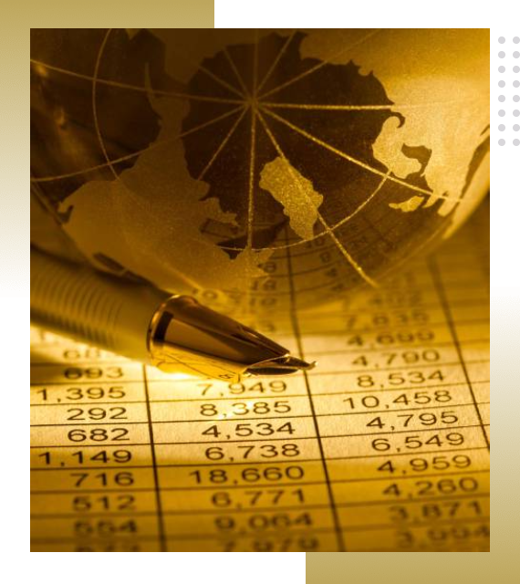 Pen resting on financial charts and a globe, symbolizing global finance.